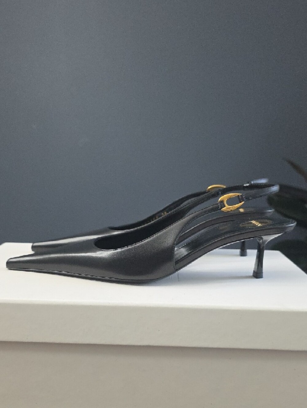 Saint Laurent Black Leather Pointed Slingback Pumps with Gold Accents - Picture 2 of 16
